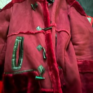Red shearling  winter coat that  comes down to the knees